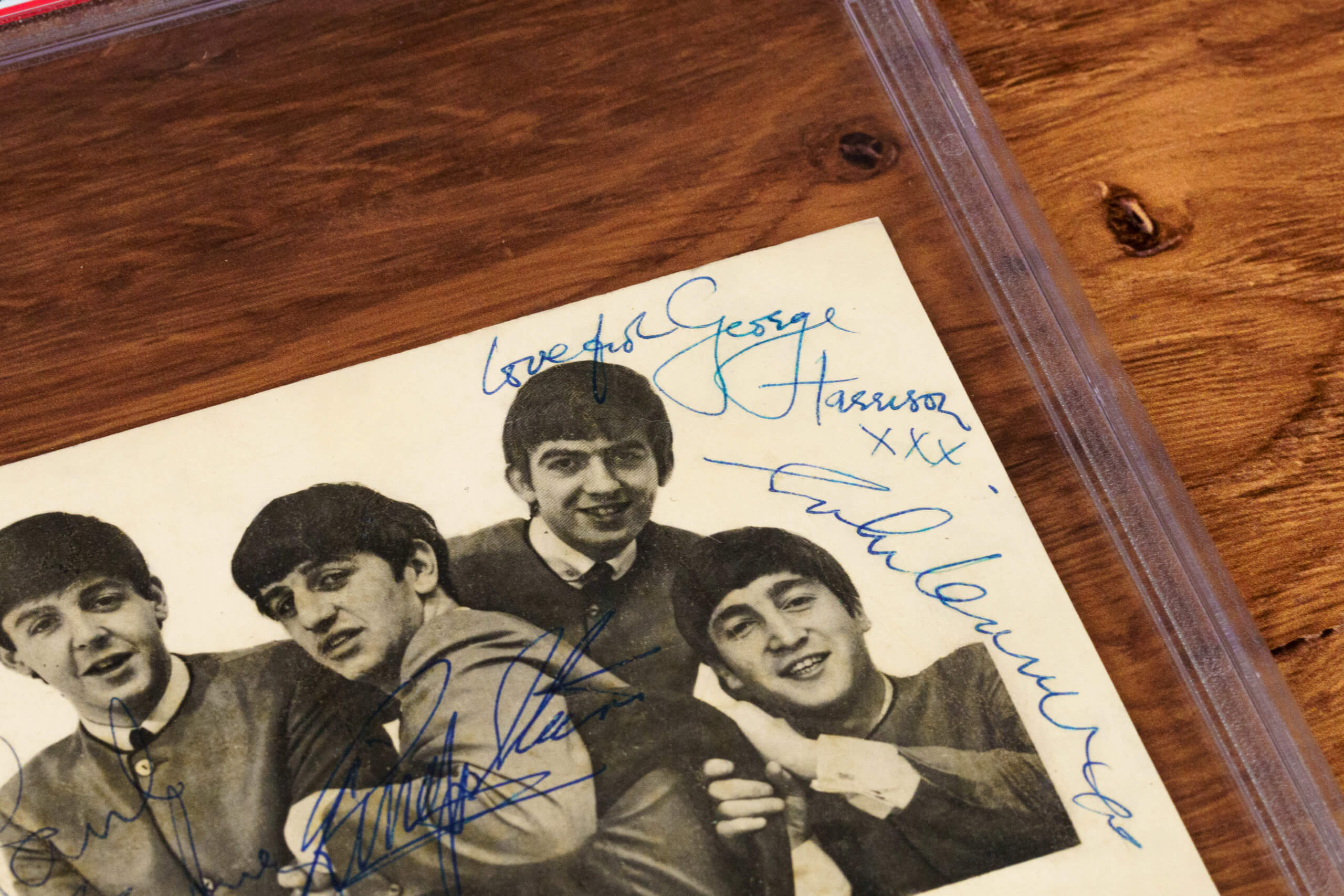 Signed card for the Beatles Fan Club with a black and white image of the band members