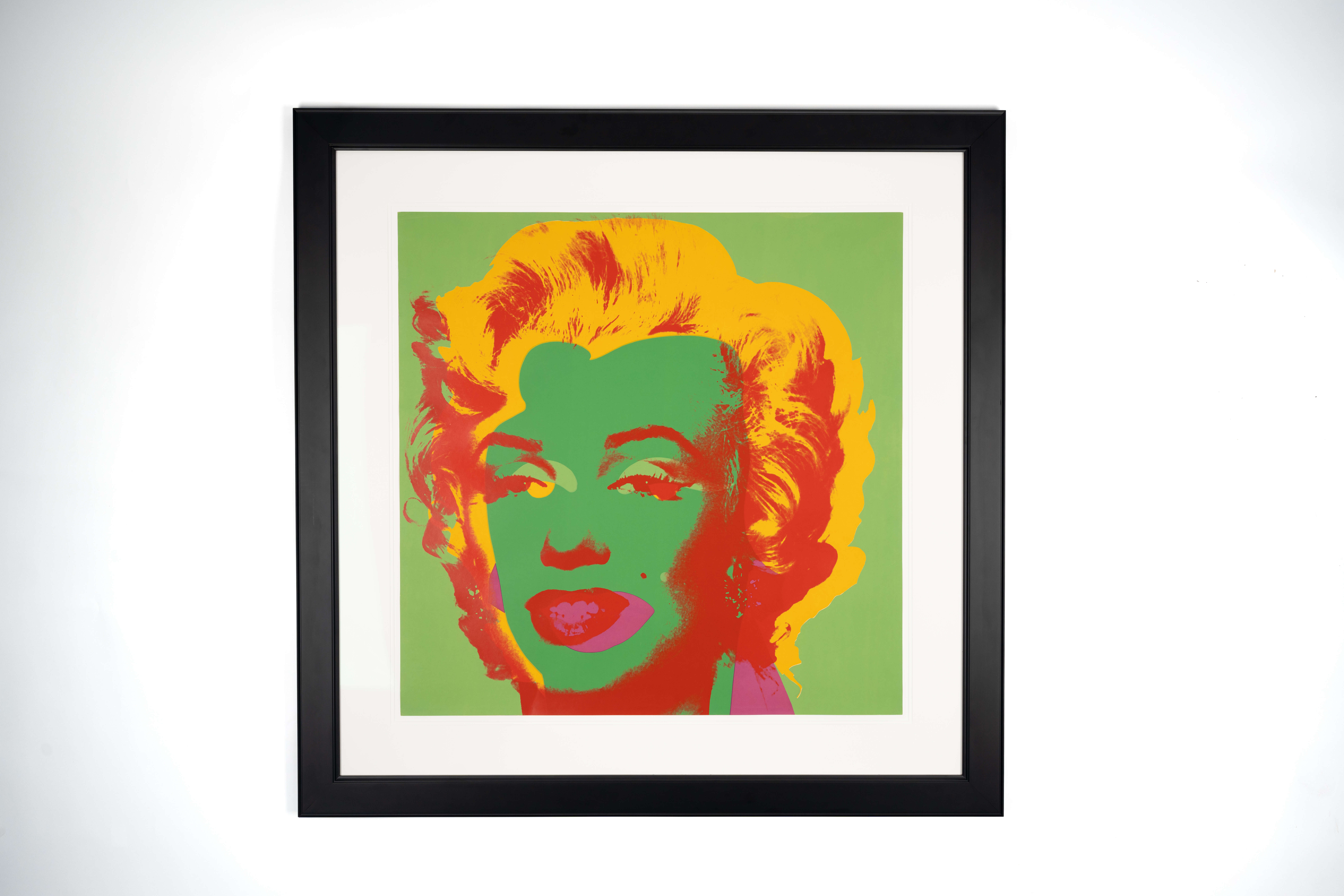 Rally’s Marilyn Monroe (Marilyn 25), 1967 by Andy Warhol. Number 14 in a black frame